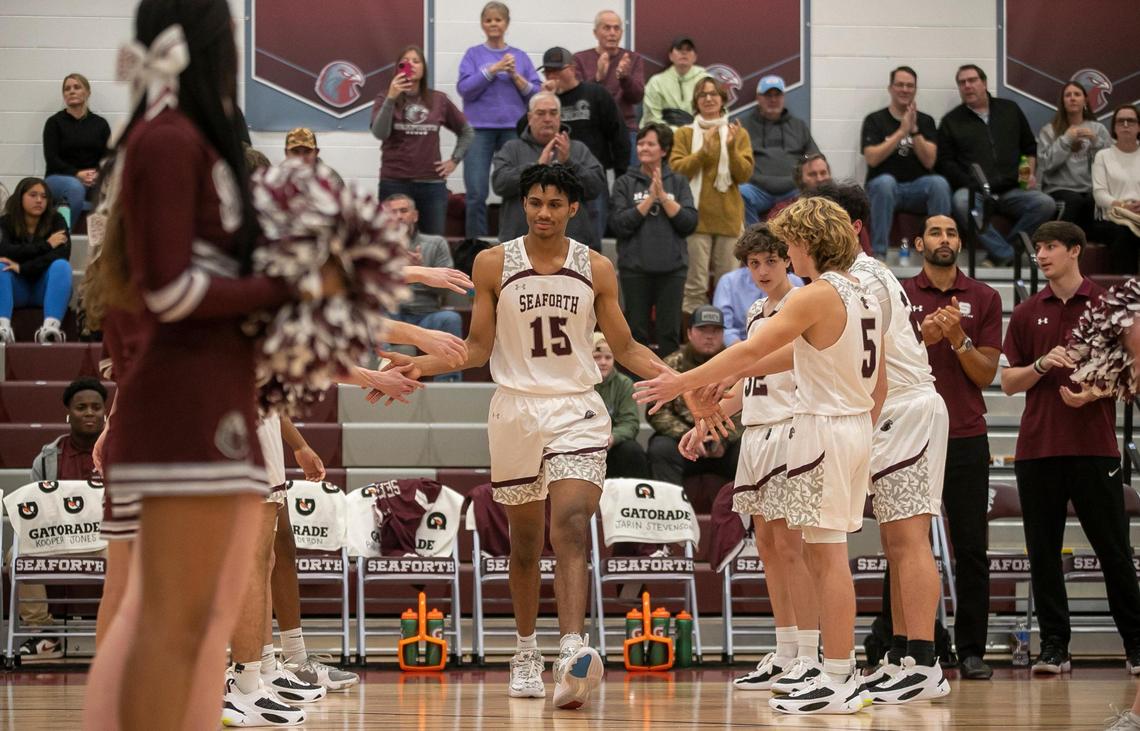 Jarin Stevenson (15) is introduced into the starting lineup for Seaforth High School prior to a game against Carrboro High School on November 18, 2022 in Pittsboro, N.C.