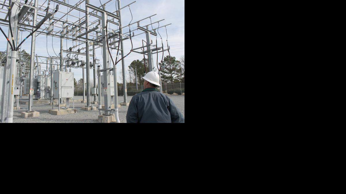 Rodney Johnson, Smithfield’s electrical superintendent, looks on at the Brogden Road substation in Smithfield on Feb. 6. Electricity coming in from Duke Energy Progress could someday be cheaper if a proposed deal gets done.