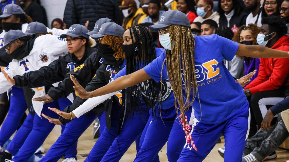 Members of the Fayetteville State Marching Bronco ‘Xpress peform at a basketball game on campus.