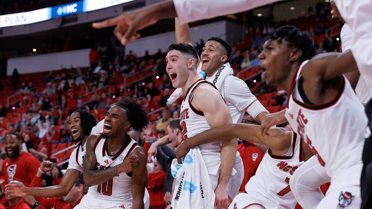 The N.C. State bench reacts in the closing minute of the Wolfpack’s 84-61 win over William & Mary at Lenovo Center on Friday, Nov. 22, 2024, in Raleigh, N.C.