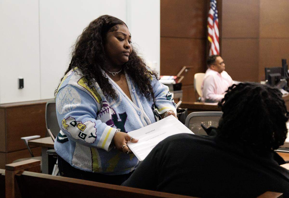 Brenay Kennard, the defendant in an alienation of affection lawsuit, reacts following the announcement of the jury’s verdict in a Durham County courtroom on Monday, Nov. 10, 2025. The jury sided with Akira Montague, who accused Kennard of ruining her marriage with her ex-husband. 
