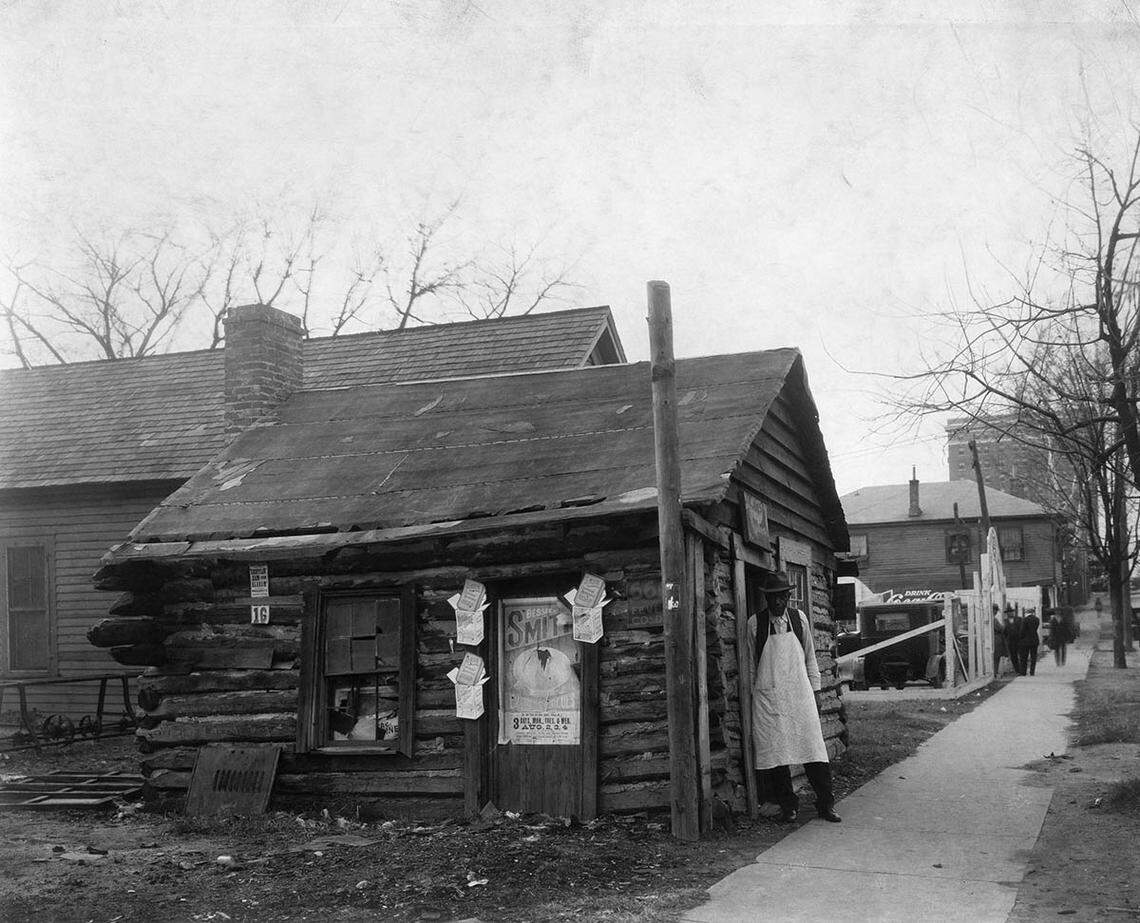 This shoemaker on East Davie Street in 1926 is playing no part in Raleigh’s red light district, but the surroundings show what the general area looked like.