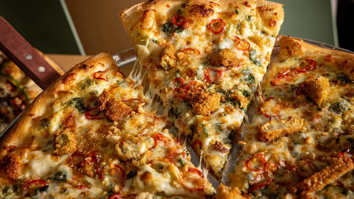 Trophy Five Points, the newest location from Trophy Brewing, expands the brand’s popular pizza menu.