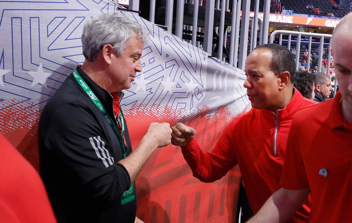 N.C. State athletics director Boo Corrigan congratulates head coach Kevin Keatts after the Wolfpack’s 94-85 victory over Louisville in the first round of the 2024 ACC Men’s Basketball Tournament at Capital One Arena in Washington, D.C., Tuesday, March 12, 2024.