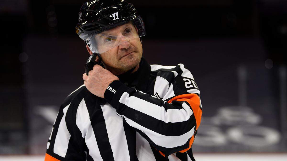 Referee Tim Peel is shown during an NHL hockey game between the Philadelphia Flyers and the New York Islanders in this Saturday, Jan. 30, 2021, file photo. Tim Peel’s career as an NHL referee is over after his voice was picked up by a TV microphone saying he wanted to call a penalty against the Nashville Predators. .(AP Photo/Derik Hamilton, File)