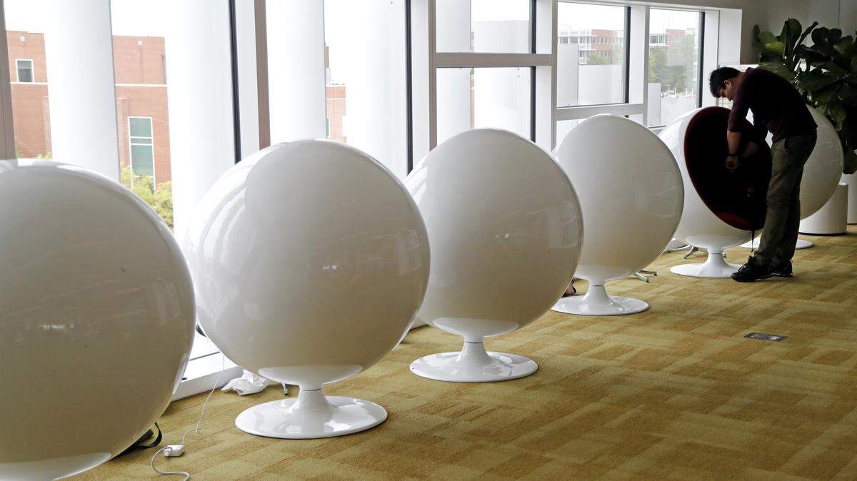 The James B. Hunt Library on the N.C. State Centennial Campus is known for its eclectic design, featuring bold colors and shapes, as well as a wide variety of furniture, like these round study pods.