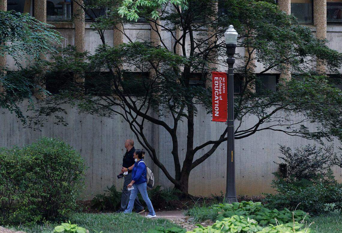 People walk around the exterior of Poe Hall on the campus of N.C. State University on Monday, July 29, 2024, in Raleigh, N.C. The university ranked 167 out of the best 500 colleges and universities in a recent WSJ/College Pulse ranking.