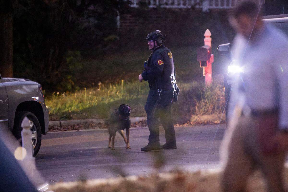 Raleigh Police work the scene where two “persons of interest” were detained Thursday afternoon on Kentford Court in Raleigh Thursday, Nov. 7, 2024. Raleigh police are investigating shots fired into eight cars and four houses, a growing total in the recent series of rush-hour shootings along Interstate 40 and near I-440.