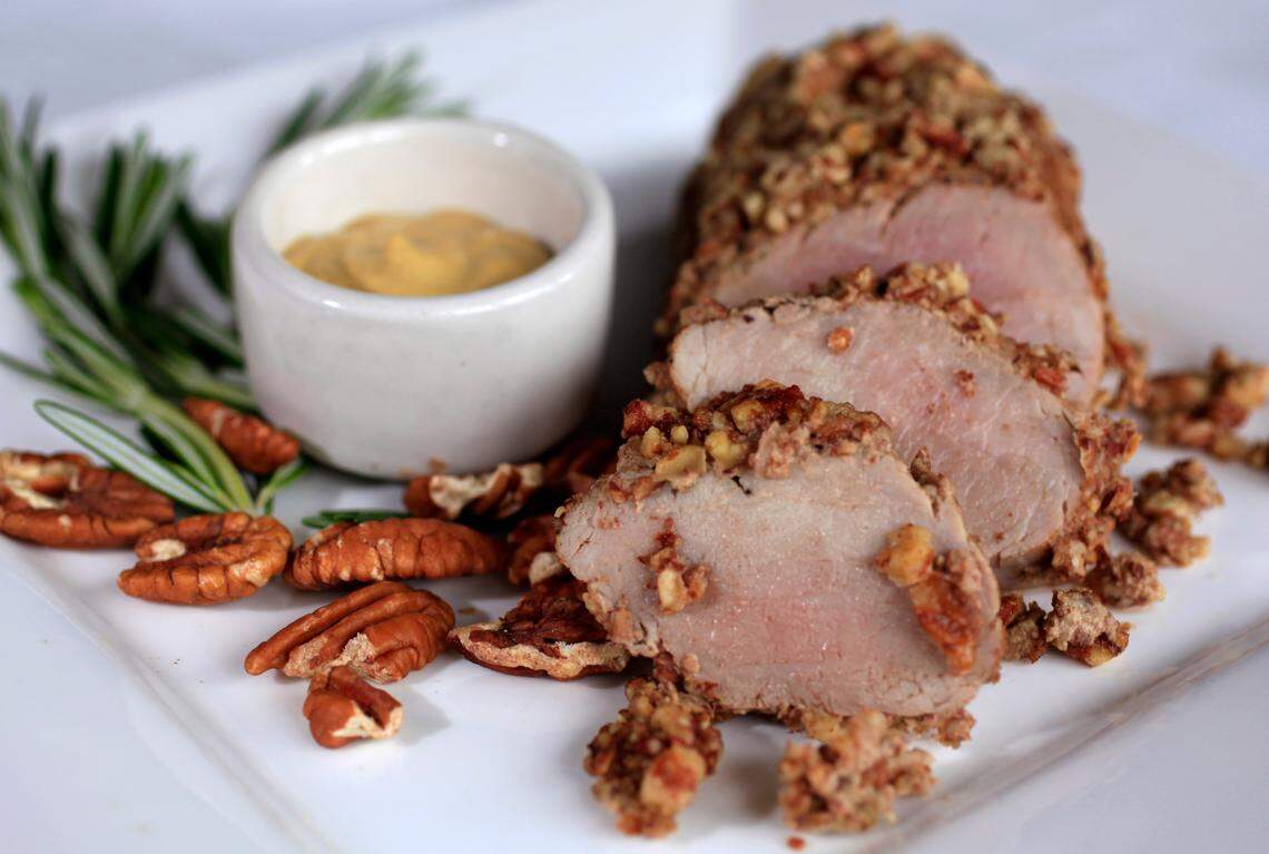Dijon pecan crusted pork tenderloin made by John Toler, owner/chef at Bloomsbury Bistro.