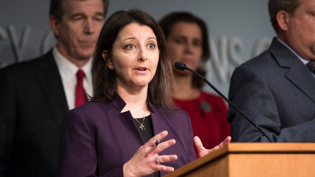 Secretary of N.C. Dept. of Health and Human Services, Dr. Mandy Cohen, answers questions at a press conference on Thursday, March 12, 2020 about why the state is discouraging public gatherings of more than 100 people in North Carolina as COVID-19 spreads.