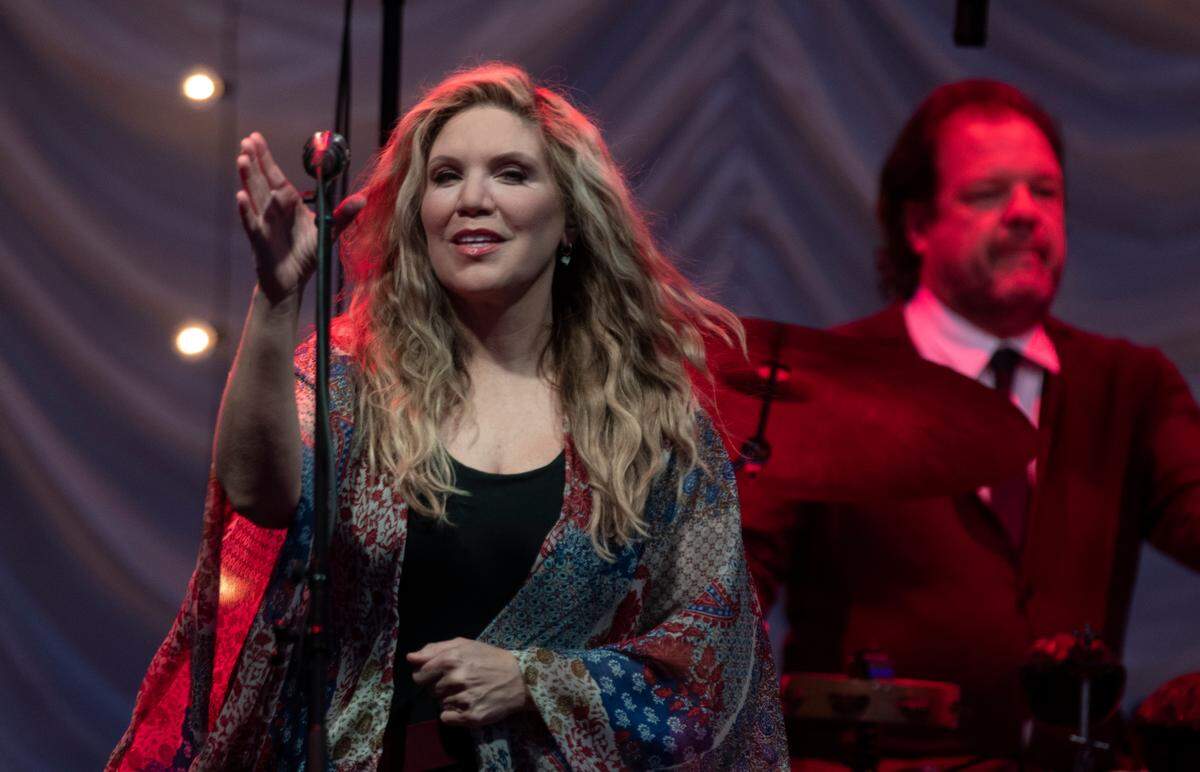 Alison Krauss in concert with Robert Plant on their “Raise the Roof Tour” Tuesday night, June 14, at Cary, N.C.’s Koka Booth Amphitheatre.