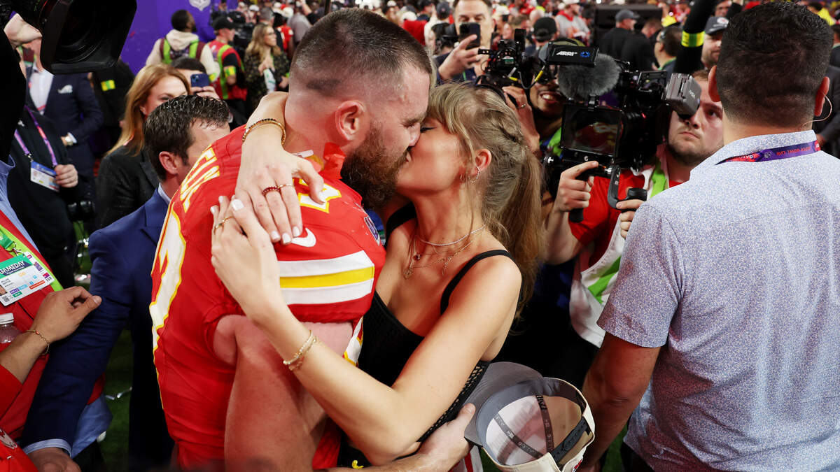 Travis Kelce of the Kansas City Chiefs and Taylor Swift embrace after defeating the San Francisco 49ers 25-22 in overtime during Super Bowl LVIII at Allegiant Stadium on February 11, 2024 in Las Vegas, Nevada.