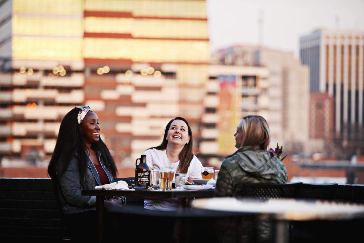 Guests enjoy the outdoor patio at Wye Hill in downtown Raleigh on Wednesday March 10, 2021.