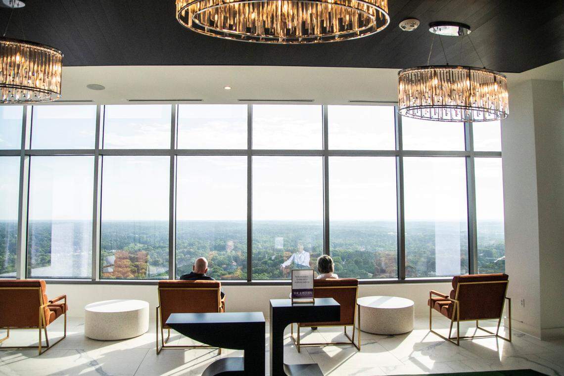 Potential renters tour Kane Realty’s 36-story luxury apartment tower off Six Forks Road called the Eastern Residences at North Hills in Raleigh Friday, May 6, 2022.