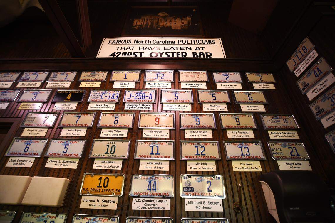 One wall of 42nd Street Oyster bar is covered with license plates donated by notable North Carolina politicians who dined at the restaurant.