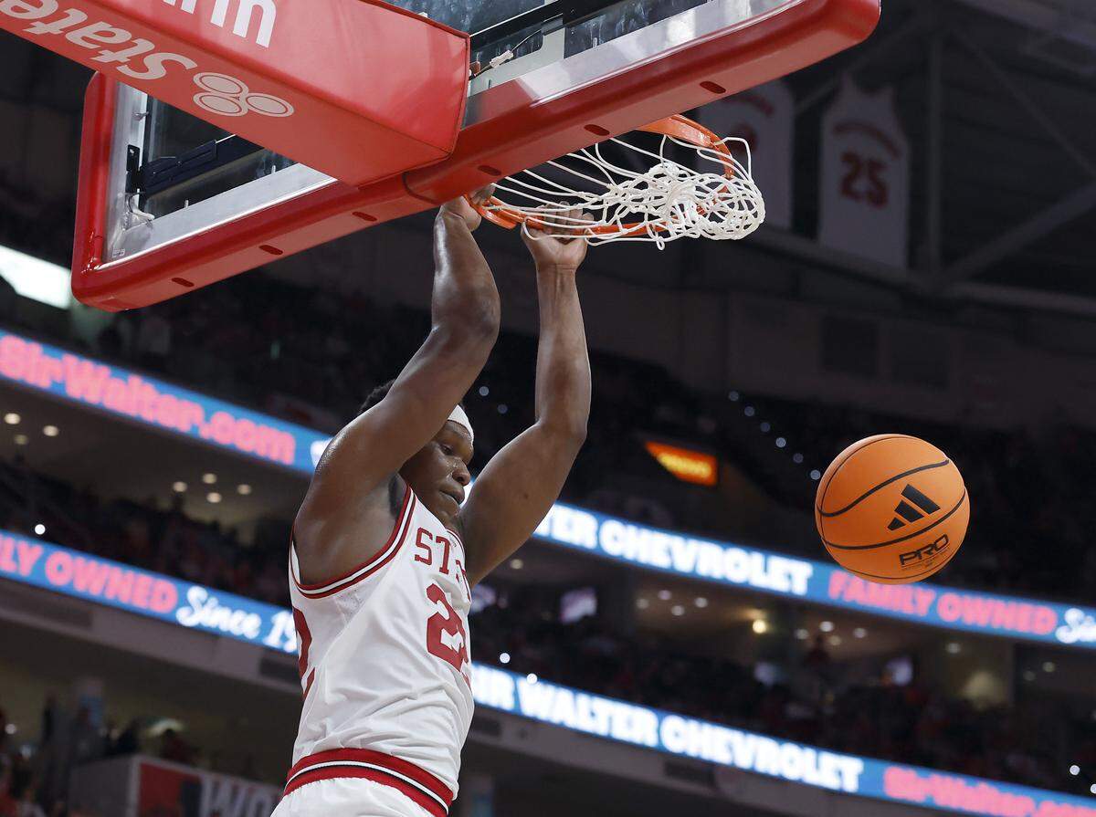 N.C. State’s Ven-Allen Lubin slams in two during the second half of the Wolfpack’s 114-66 win over North Carolina Central at Lenovo Center on Monday, Nov. 3, 2025, in Raleigh, N.C.