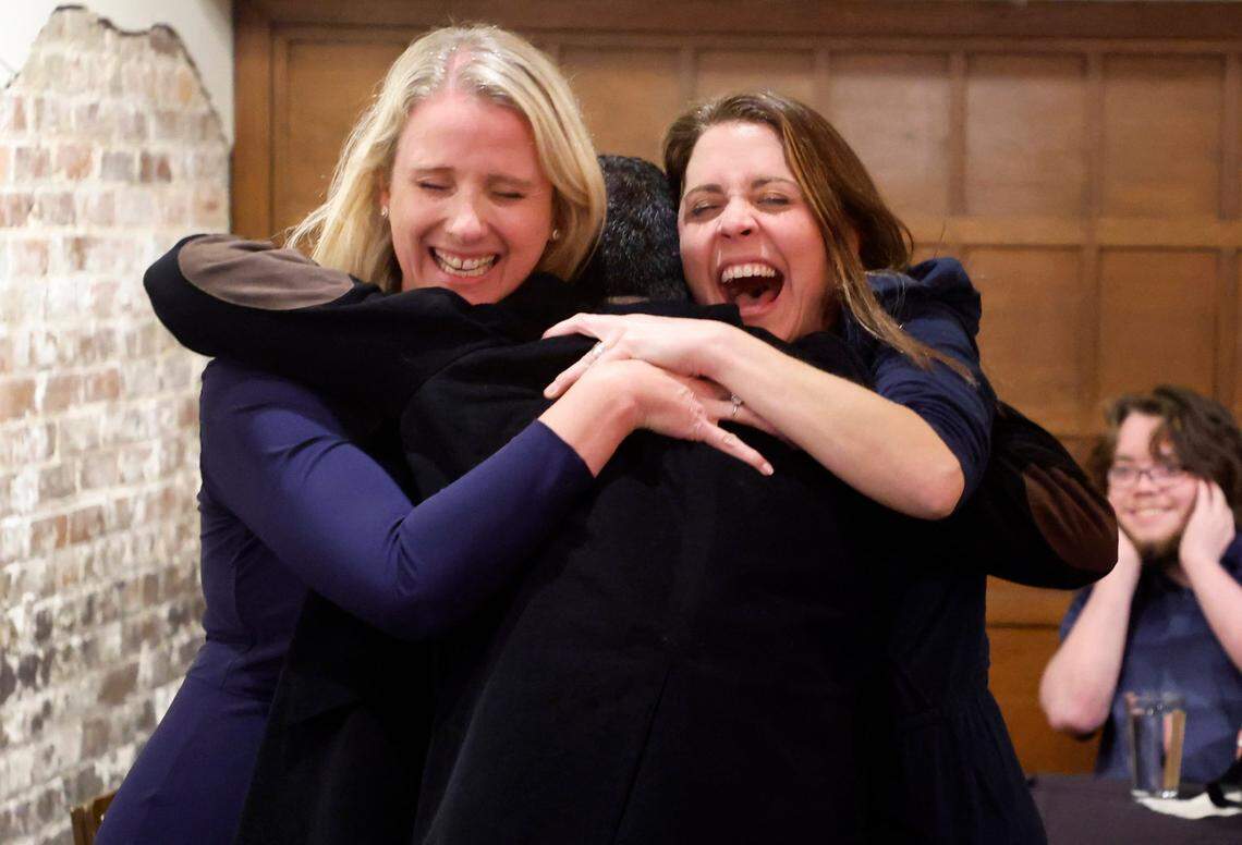 Caroline Nickel, Wiley Nickel’s wife, left, and her best friend, Kathryn Sharp, hug Indi Subram after Nickel won North Carolina’s 13th Congressional District Tuesday, Nov. 8, 2022. The three were at a during campaign party at for Nickel at Sitti in Raleigh, N.C.