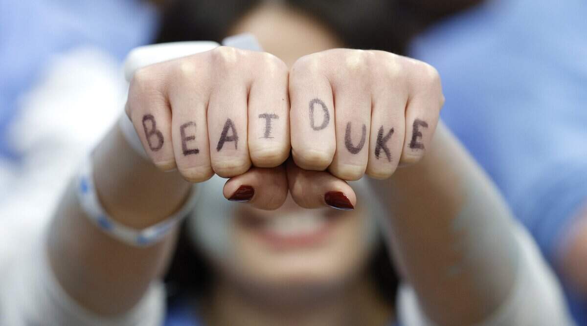 North Carolina senior Katherine Sullivan used her fingers to cheer on the Tar Heels before Duke’s game against UNC at the Dean E. Smith Center in Chapel Hill, N.C., Saturday, Feb. 7, 2026.