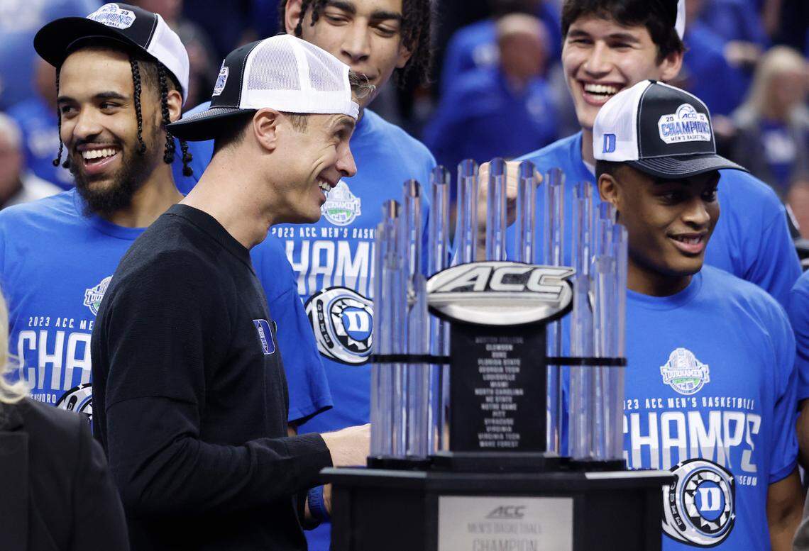 Duke head coach Jon Scheyer celebrates after the Blue Devils’ 59-49 victory over Virginia to win the ACC Men’s Basketball Tournament in Greensboro, N.C., Saturday, March 11, 2023.
