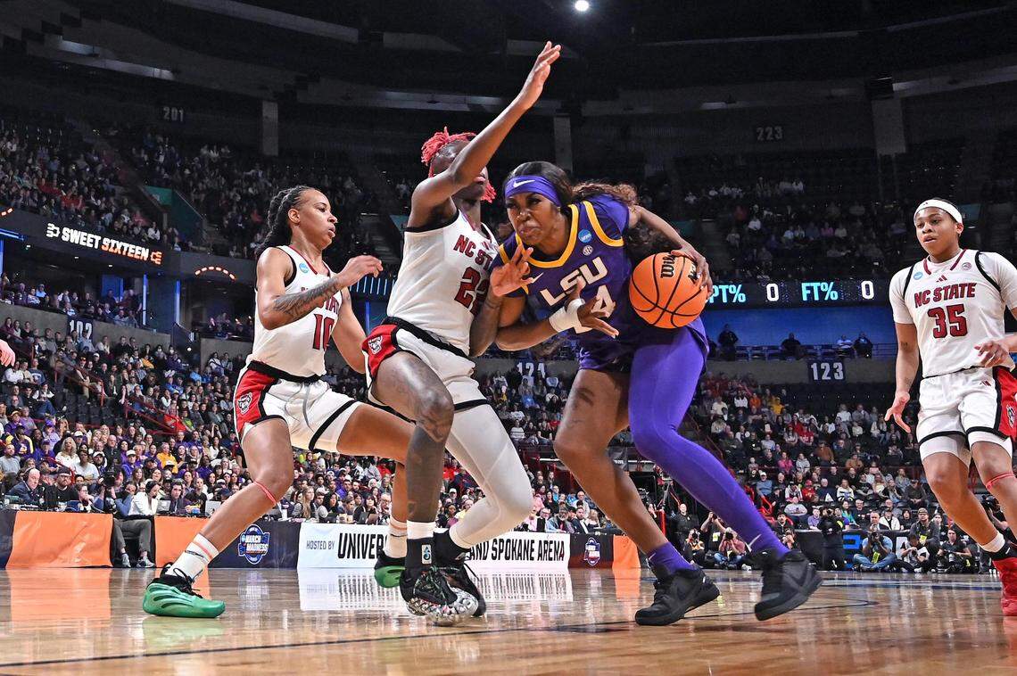 LSU Lady Tigers forward Aneesah Morrow (24) shoots against NC State Wolfpack guard Saniya Rivers (22) during the first half of a Sweet 16 NCAA Tournament basketball game at Spokane Arena.