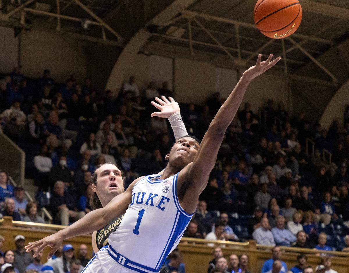 Duke’s Caleb Foster drives past UNC Pembroke’s Steven Lassiter during the second half of the Blue Devils’ 109-64 exhibition win on Wednesday, Nov. 1, 2023, at Cameron Indoor Stadium in Durham, N.C.