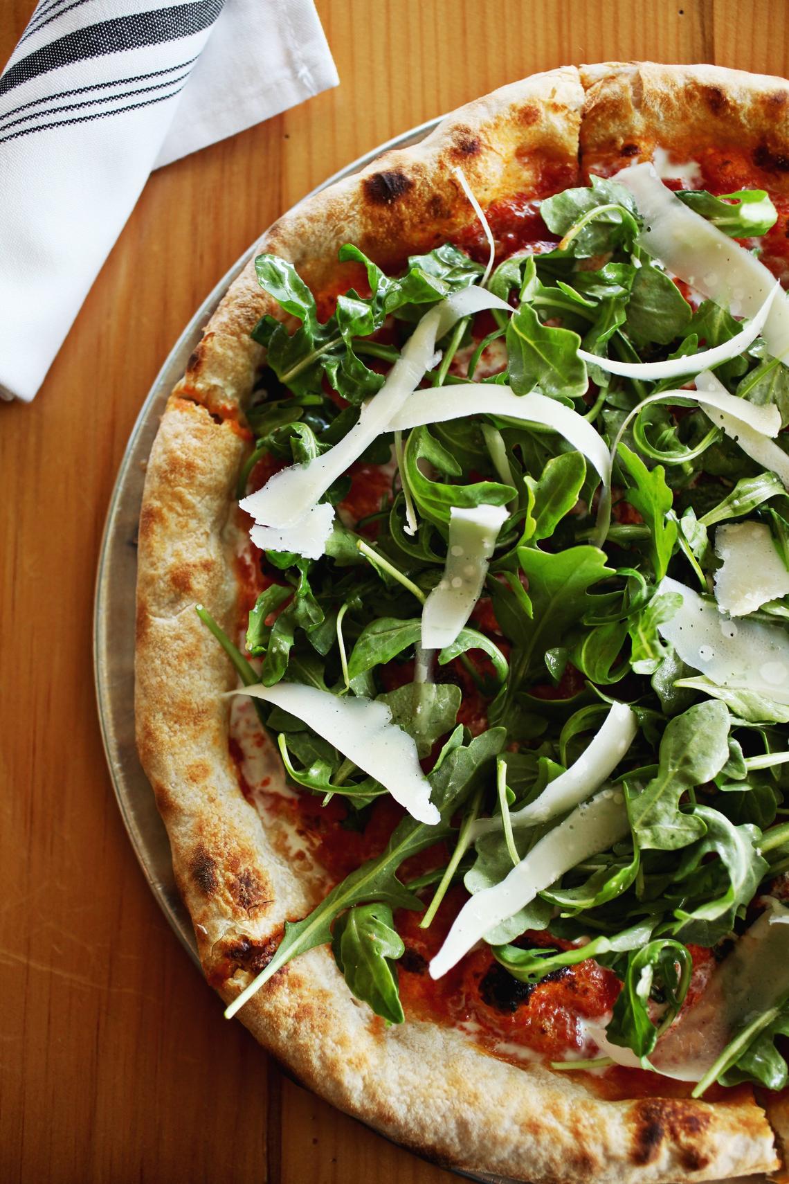 Toppings are “a mix of classics and combinations that change with the market and the chef’s inspiration” live up to the high standard of the crust at Pizzeria Mercato in Carrboro.