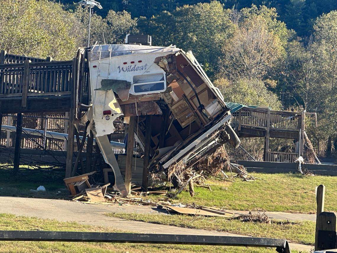 A recreational vehicle snagged on a wooden walkway at Carrier Park in Asheville, North Carolina. The French Broad River carried the RV downstream into the park, which is across the river from a section of Interstate 40 that also flooded after the remnants of Hurricane Helene hit Western North Carolina.