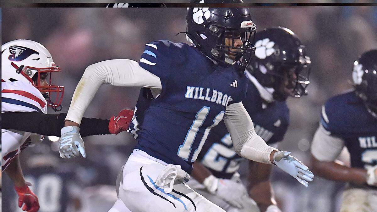 Millbrook strong safety Cairo Williams (11) sprints downfield towards the missed punt from Jordan during the first half. The Millbrook Wildcats and the Jordan Falcons met in the third round of the NCHSAA 8A football playoffs in Raleigh, N.C. on November 21, 2025.