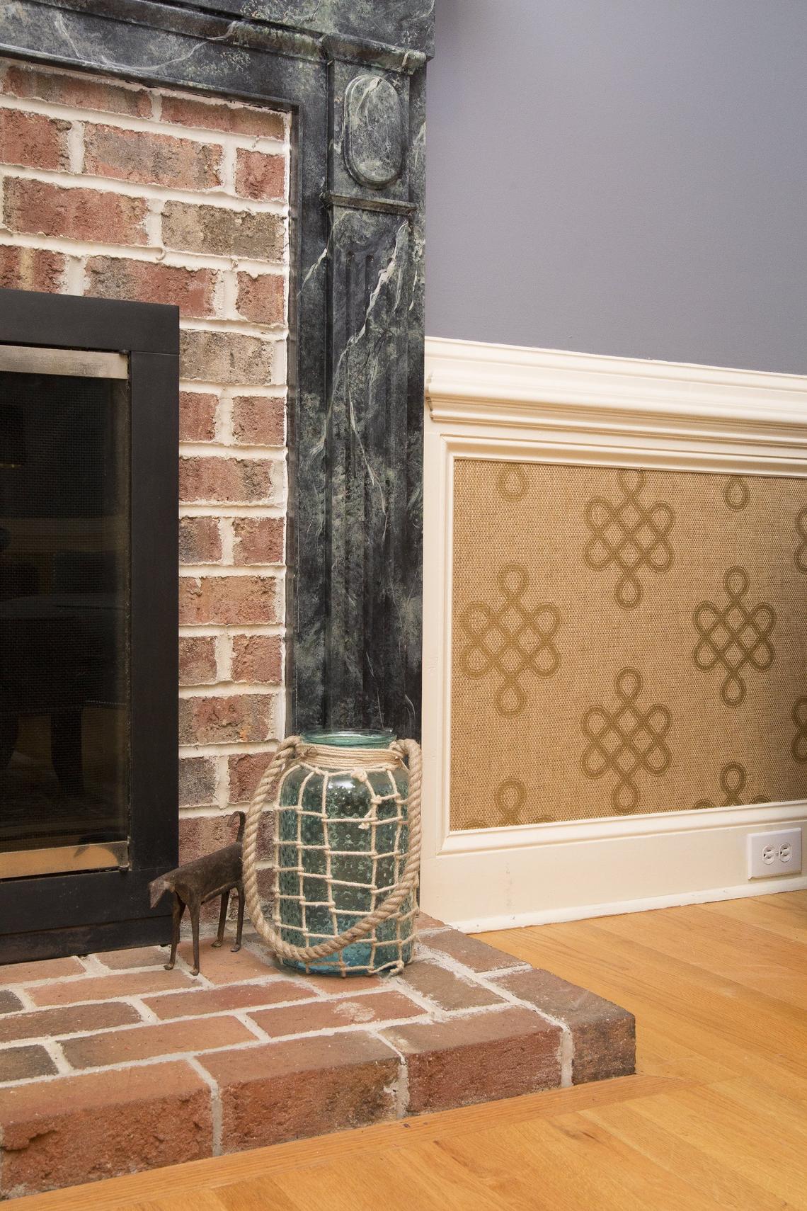 Donâ€™t forgot wallpaper in a small area can instantly change the look of the space.  A printed paper weave with a stamped metallic design was used under the chair rail in this family room. It is made by Thibaut.  Adding an accent of wallpaper to a room can add color, texture, and pattern.  Any of these factors can make your room look better.