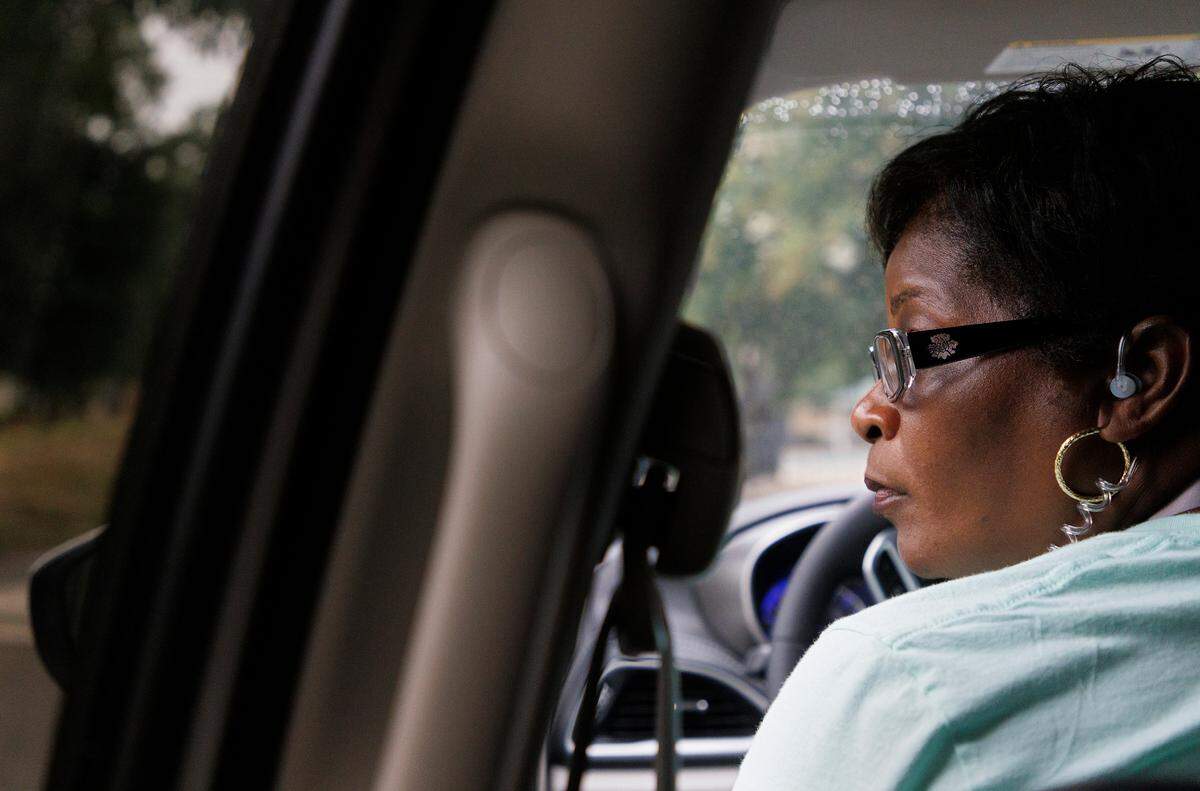 Gwen Baggett, a crisis response clinician with Durham’s HEART team, arrives to follow up on a call in Durham, N.C. on Thursday, June 27, 2024. HEART, which stands for Holistic Empathetic Assistance Response Teams, sends unarmed specialists instead of (or alongside) police to some emergency calls.