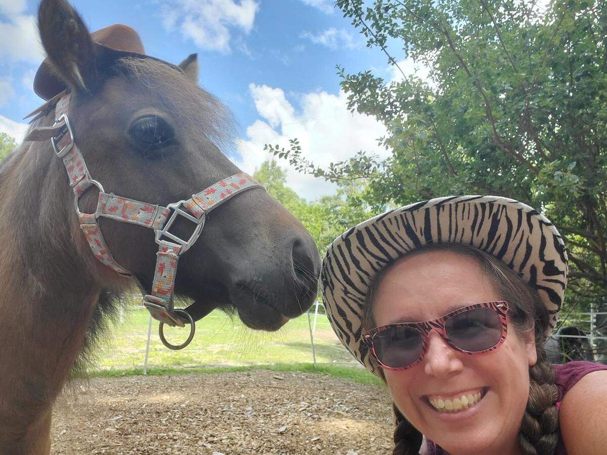 Emily Haas believes the idea to adopt her miniature horse Mocha came from divine inspiration.