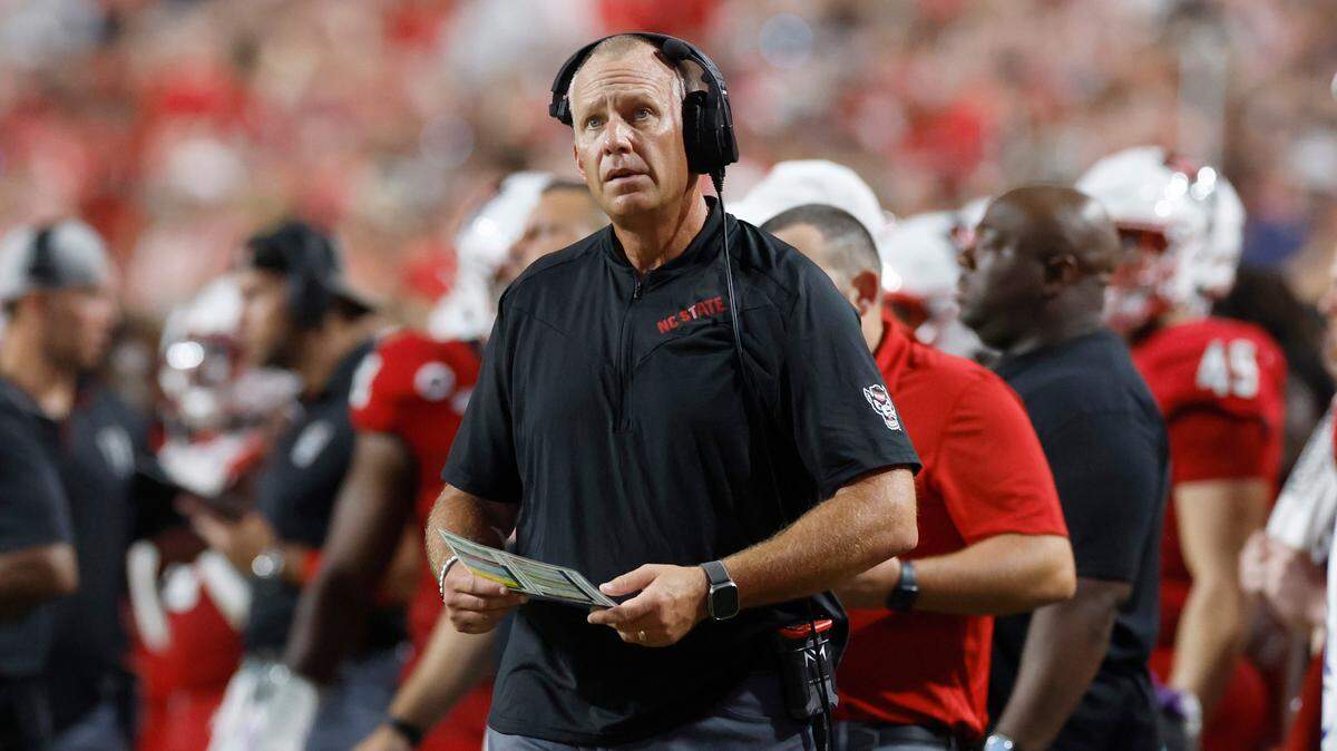 N.C. State head coach Dave Doeren looks up at the scoreboard during the first half of N.C. State’s game against Western Carolina at Carter-Finley Stadium in Raleigh, N.C., Thursday, August 29, 2024.