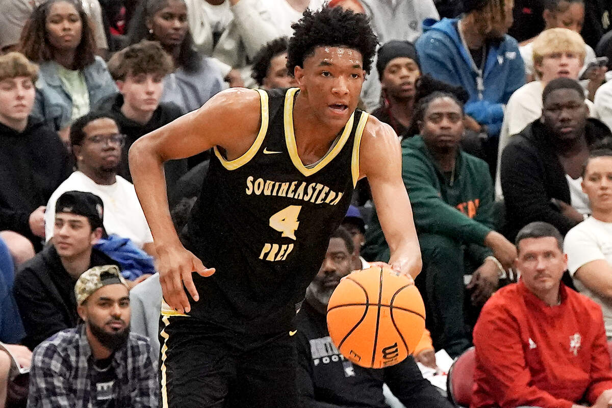 Southeastern Prep's CJ Rosser, Jr. drives towards the lane against Davidson Day During the first half. The Davidson Day Patriots and the Southeastern Prep Academy National Falcons met in the John Wall Holiday Tournament in Raleigh, N.C. on December 27, 2025.
