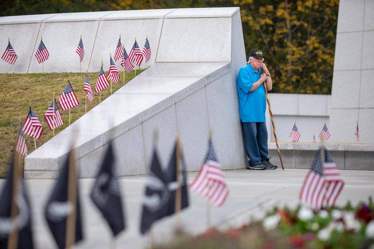 Gaylord Gable, a U.S. Marine Corps veteran who served in the Korean War, awaits the start of the Veterans Day Observance ceremony honoring veterans of all wars and conflicts at Veterans Freedom Park in Cary, N.C. on Thursday, Nov. 11, 2021.