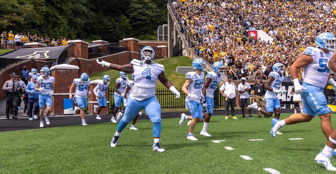 North Carolina defensive lineman Travis Shaw (4) reacts as he enters Kidd Brewer Stadium for the Tar Heels game against Appalachian State bon Saturday, September 3, 2022 at Kidd Brewer Stadium in Boone, N.C