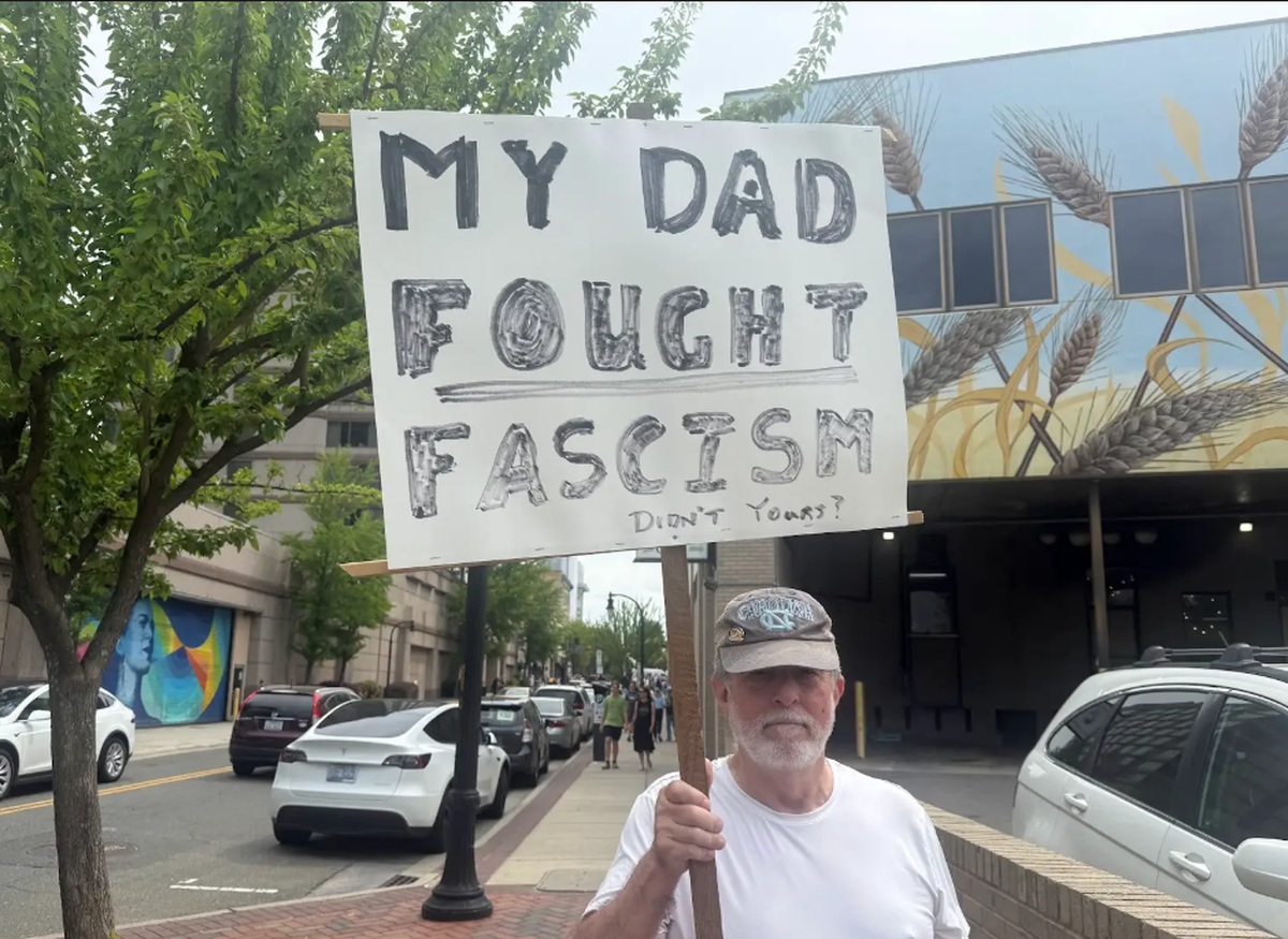 David Hartwell, 72, was one of 1,000 or more people who gathered in downtown Durham Saturday to protest Trump administration policies.