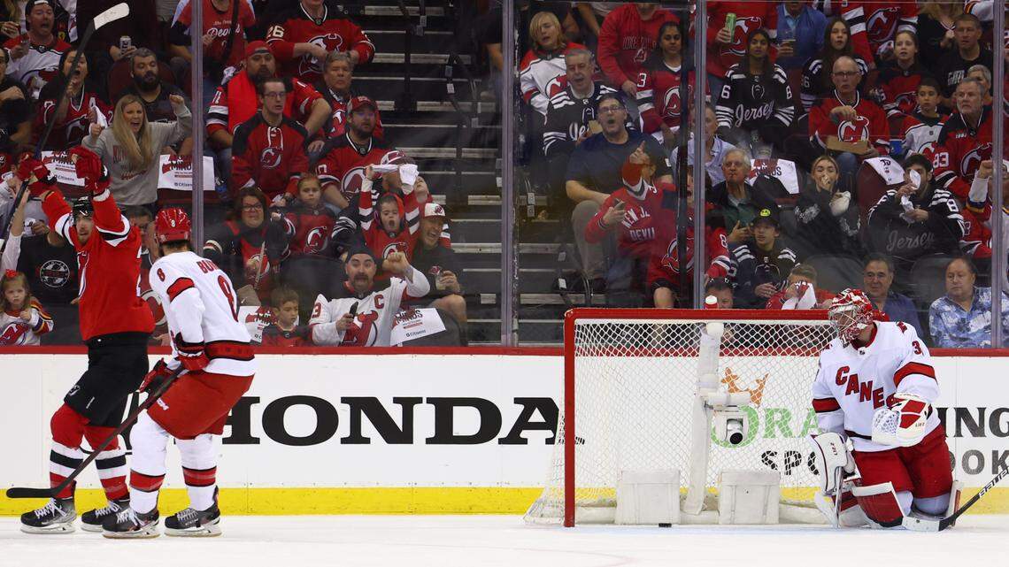 May 7, 2023; Newark, New Jersey, USA; New Jersey Devils center Michael McLeod (20) scores a goal against the Carolina Hurricanes during the first period in game three of the second round of the 2023 Stanley Cup Playoffs at Prudential Center. Mandatory Credit: Ed Mulholland-USA TODAY Sports