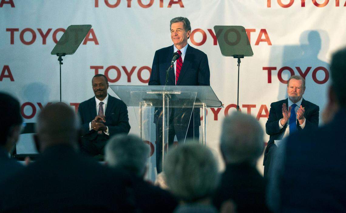 North Carolina Gov. Roy Cooper announces that the future use of the Greensboro-Randolph Megasite will be as a new Toyota battery manufacturing plant in Liberty, N.C., on Monday, Dec. 6, 2021. (Kenneth Ferriera/News & Record via AP)