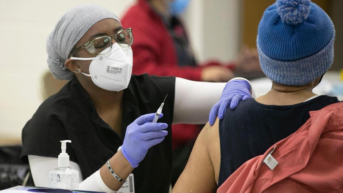 Dr. LaToya Woods administers the COVID-19 vaccine for a patient at Macedonia New Life Church on Rock Quarry Road on Saturday, February 6, 2021 in Raleigh, N.C.