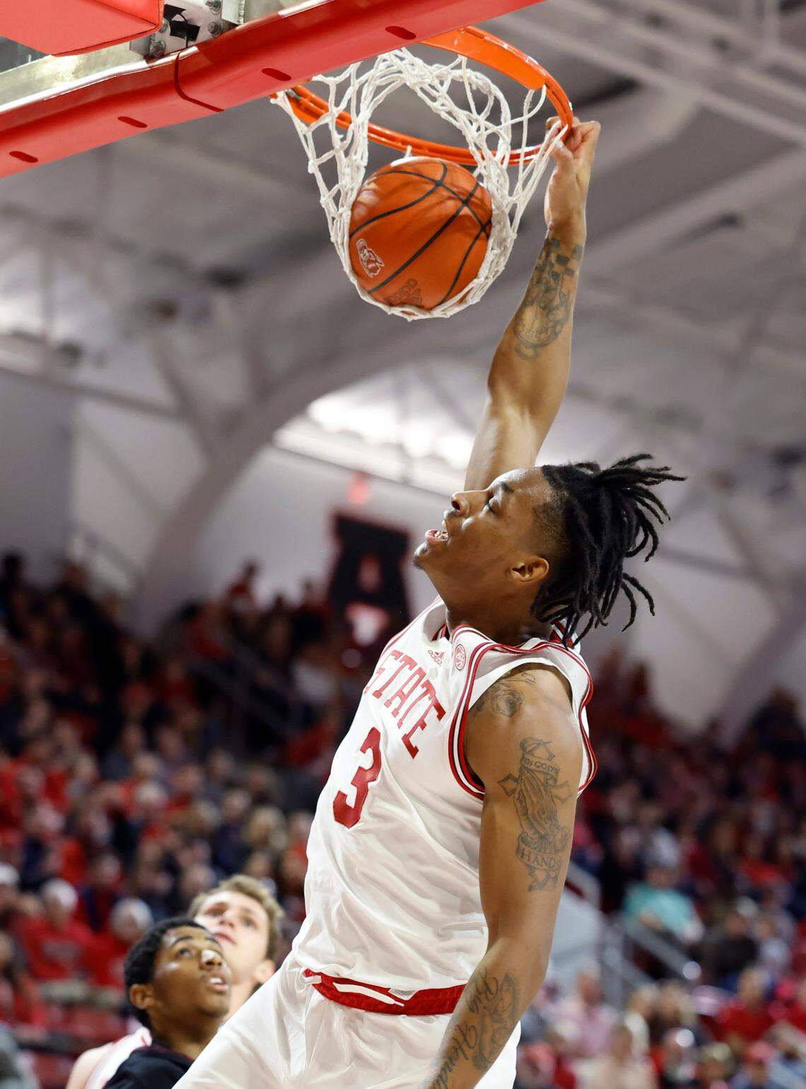 N.C. State’s MJ Rice (3) slams in two during the second half of N.C. State’s 93-61 victory over Maryland Eastern Shore at Reynolds Coliseum in Raleigh, N.C., Wednesday, Dec. 6, 2023.