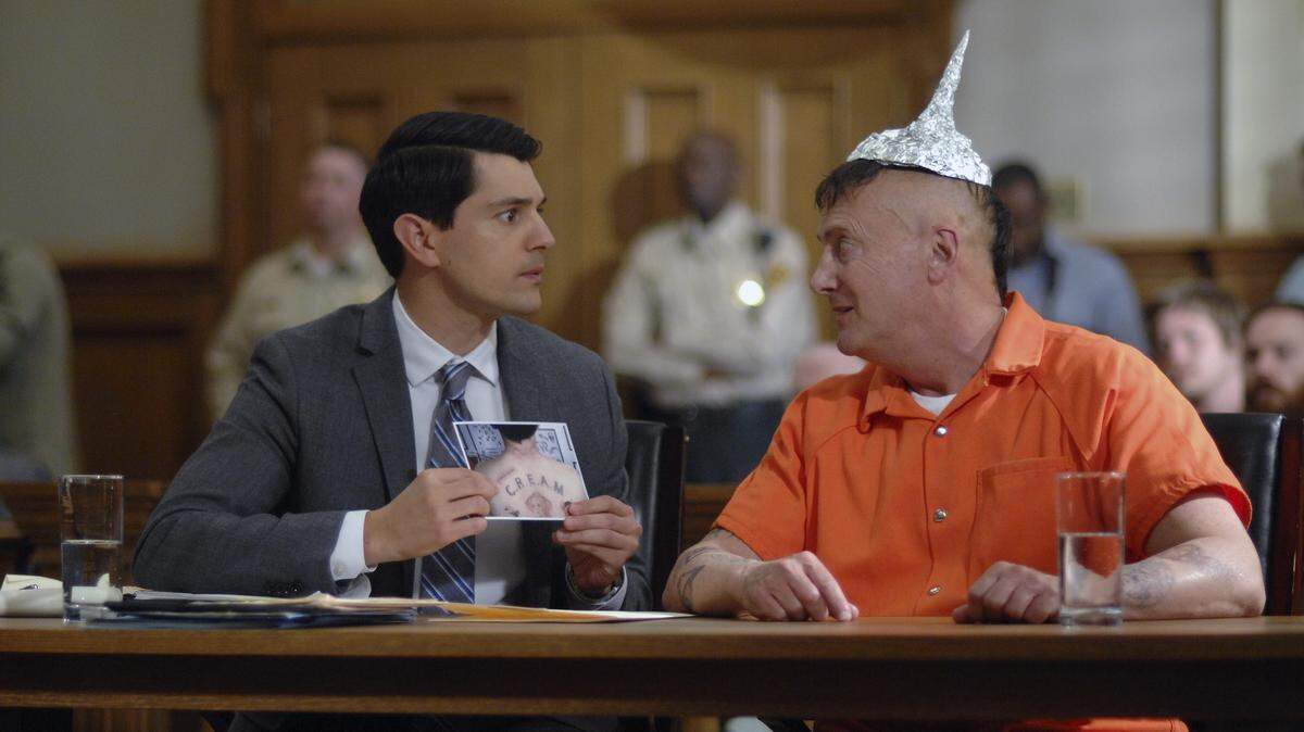 Nicholas D’Agosto, left, as Josh Segal, and Michael Hitchcock as Jesse Ray Beaumont in NBC’s “Trial & Error: Lady, Killer.”
