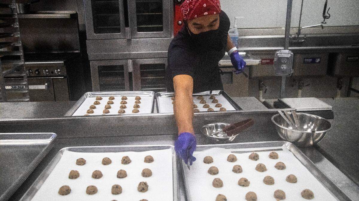 Matt Navarro prepares cookie dough at Without A Trace Foods in Raleigh Tuesday, Dec. 15, 2020. The startup makes allergy-free snacks.