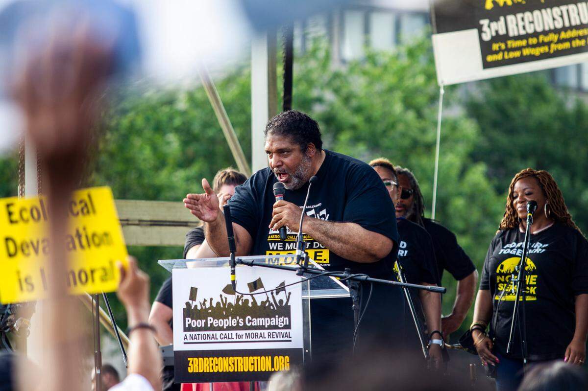 The Rev. Dr. William J. Barber II leads a National Poor People’s Campaign rally Monday, June 21, 2021 at Halifax Mall in Raleigh. The campaign kicked off what is billed as a year’s worth of events leading up to a mass march on Washington in June 2022.