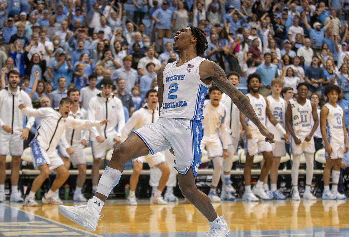 North Carolina’s Caleb Love (2) reacts after a dunk to give the Tar Heels a 102-84 lead against College of Charleston in the final seconds of play on Friday, November 11, 2022 at the Smith Center in Chapel Hill, N.C.
