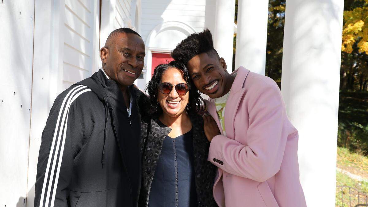 Robert Hartwell posed with his stepmother, Ilene, and father, William, in front of his new house in Great Barrington, Massachusetts.