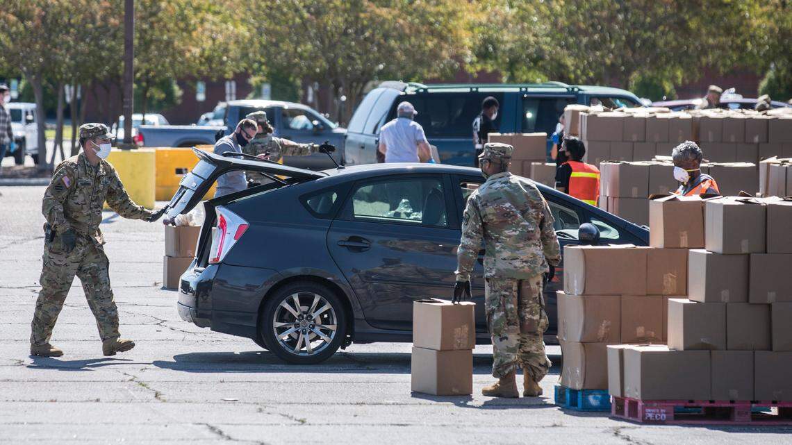 Second Harvest Food Bank of Southeast North Carolina donated 25,000 pounds of food to around 1,200 families in the parking lot at the Crown Coliseum in Fayetteville, N.C. on Thursday, May 7, 2020. Members of the National Guard joined volunteers from food banks, Team Rubicon and Cumberland County Emergency Management to distribute the food to the many cars that had been lined up for hours.