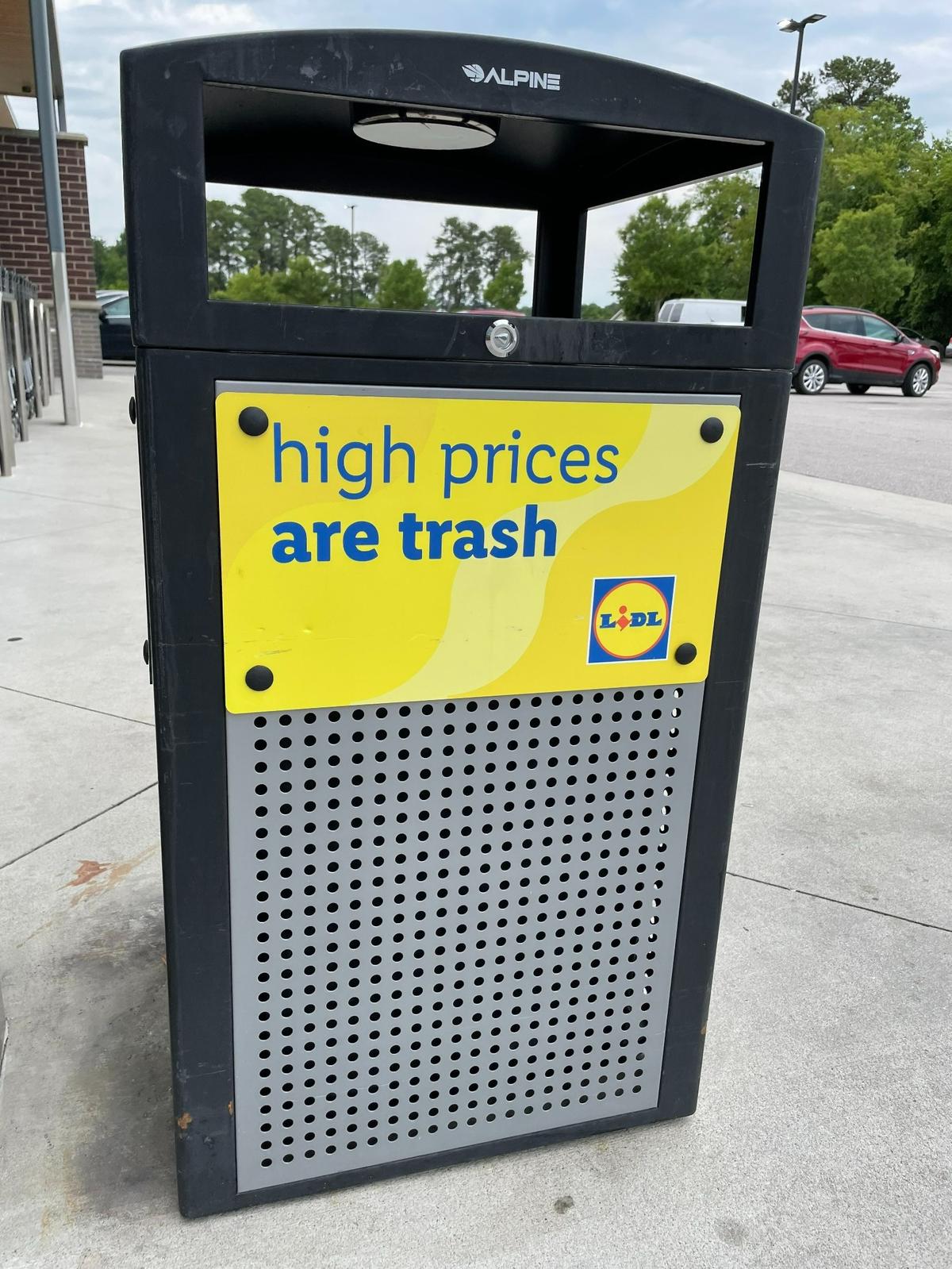 “High prices are trash,” reads a garbage can outside the Lidl store on Wake Forest Road in Raleigh, NC.