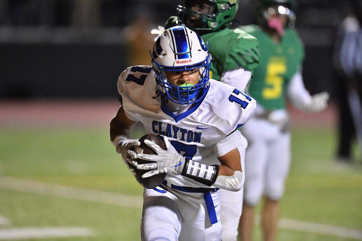 Clayton running back Parker Ferguson (17) scores the go-ahead touchdown against Cardinal Gibbons late in the second half. The Clayton Comets and the Cardinal Gibbons Crusaders met in the East Regional Final of the NCHSAA 7A Football Championship in Clayton, N.C. on December 4, 2025.