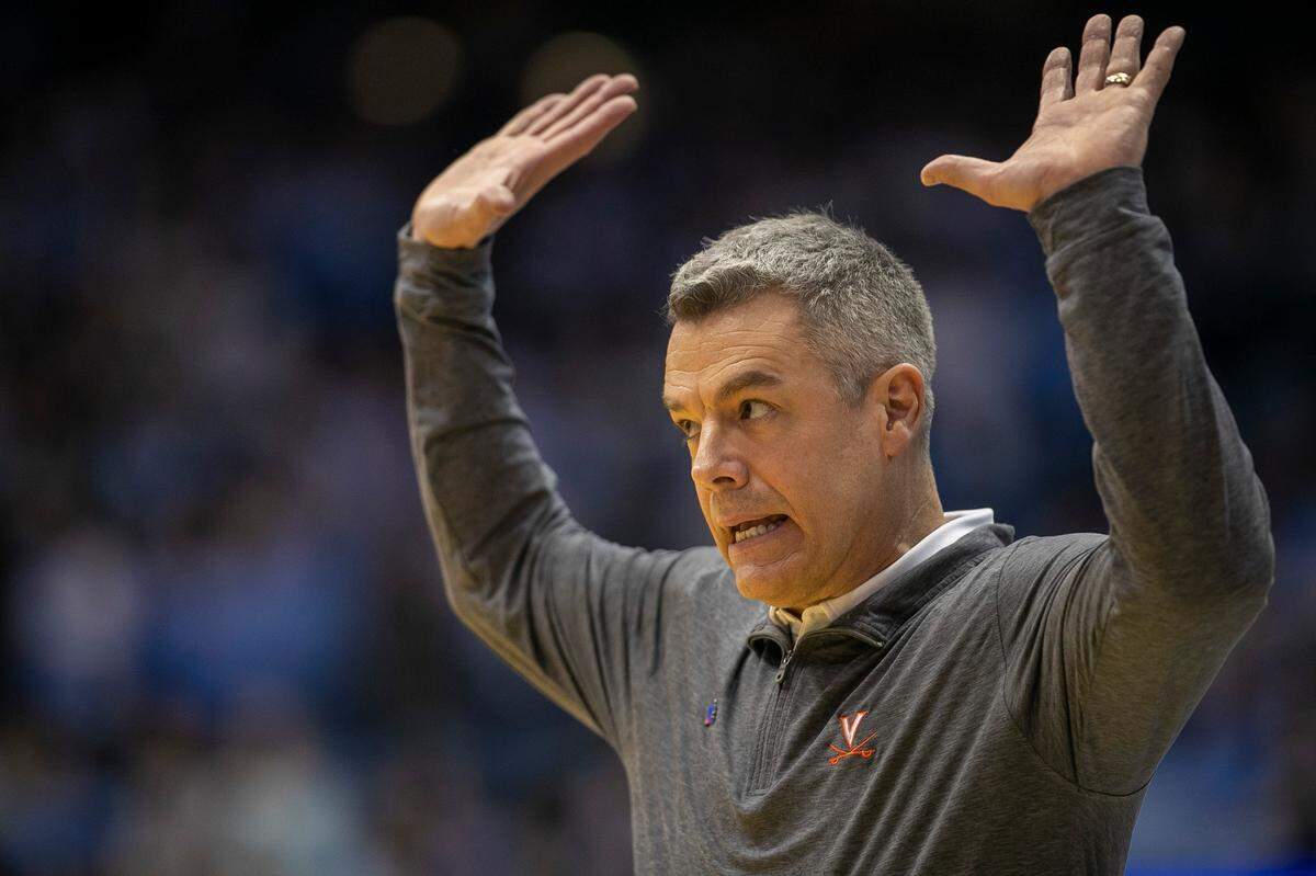 Virginia coach Tony Bennett directs his team on defense during the first half against North Carolina on Saturday, February 25, 2023 at the Smith Center in Chapel Hill, N.C.