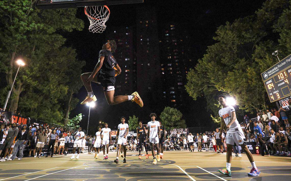 Class of 2026 recruit Deron Rippey Jr. dunks the ball during the SLAM Summer Classic at Rucker Park on August 18, 2025 in New York City. 